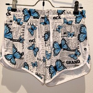 Newspapers and butterfly shorts